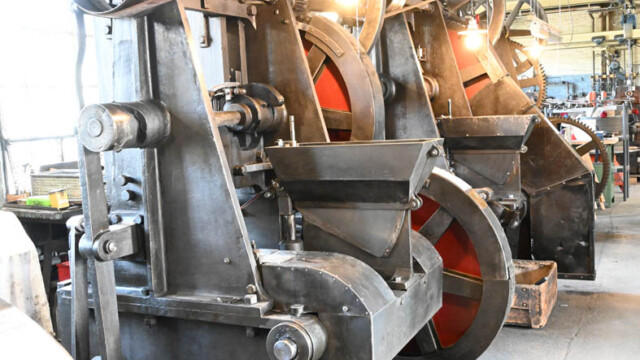 An old machine with a belt drive