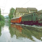 And again the Ae 3/6 I 10648 with the RHB B 11 in reverse direction towards Rorschach. Once again, it creates some nice waves. August 01, 1987 Photo: E. Meier